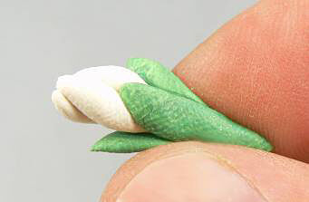Green clay wrapped around white clay